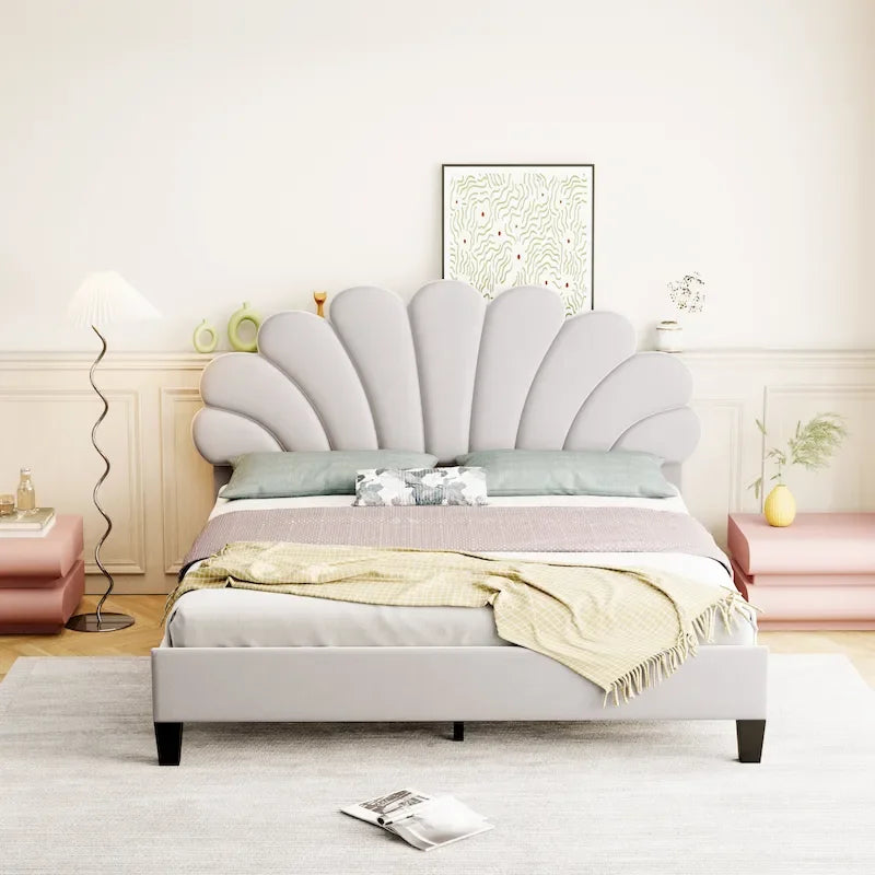Cama con plataforma tapizada y cabecero con estampado floral
