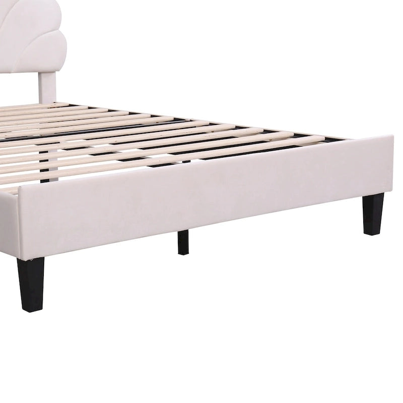 Cama con plataforma tapizada y cabecero con estampado floral