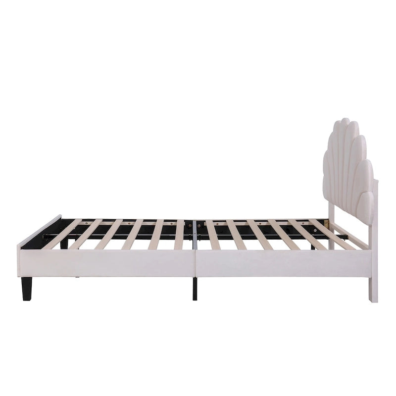 Cama con plataforma tapizada y cabecero con estampado floral